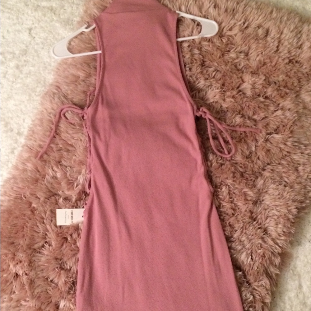 Rose pink mock turtleneck ribbed dress.